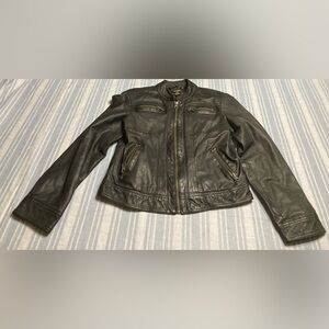 Clothes by Revue black leather jacket.